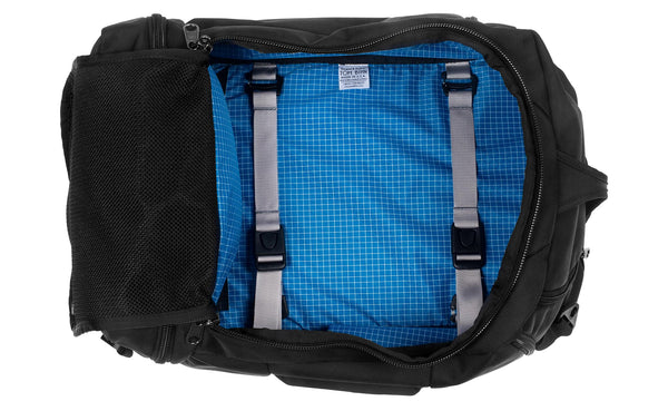 An open Techonaut 45 with a Black exterior and an Island (bright blue) interior.
